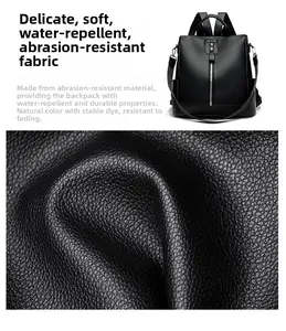 Detail view of water-resistant black oxford fabric and metal zipper on backpack