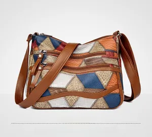 Dettaglio delle tasche con cerniera a più strati e del patchwork in ecopelle colorata
