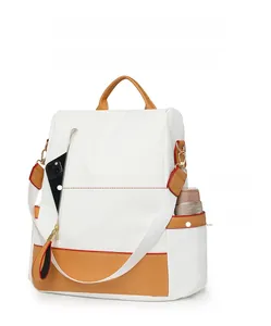 Detailed view of large backpack featuring front zipper pocket and side umbrella holder