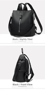 Detail view showing black lychee texture leather backpack with silver zippers
