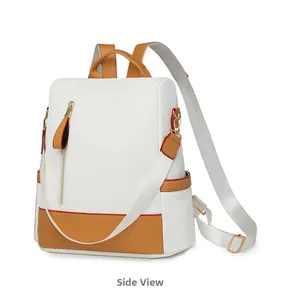Side view of white and brown leather fashion backpack with vertical zipper and side pocket