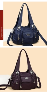 Detail of vintage pleated faux leather bags in navy and burgundy with floral charms