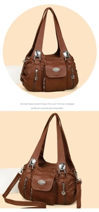 Close-up of retro multi-pocket brown handbag with silver zippers and petal charms