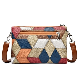 Retro color-block patchwork crossbody bag with textured faux leather and adjustable strap