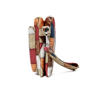 Retro patchwork leather clutch bag for women with triple accordion compartment design