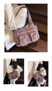 Detailed view of mauve tote bag with large front pockets and silver ring details
