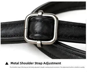 Detail of adjustable black textured leather strap with silver square metal buckle