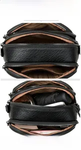 Macro view of multi-compartment leather bag with three main sections and striped lining