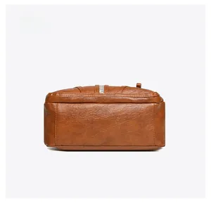 Flat bottom view of large capacity vintage brown leather shoulder bag with fine stitching