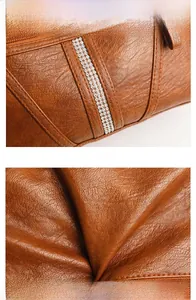 Close-up of brown textured faux leather with sparkling rhinestone decorative band