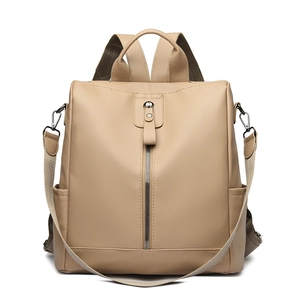 Beige oxford fabric backpack for women featuring multiple straps and vertical front zipper