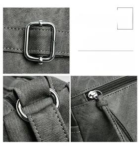 Vues détaillées des ferrures en argent poli et du tissu gris résistant sur le sac à main