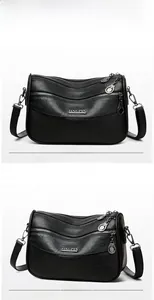 Front and side 45-degree angle views of a black multi-layer lychee grain leather handbag