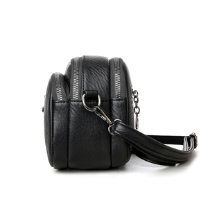 Classic black leather crossbody bag with three zipper compartments and silver hardware