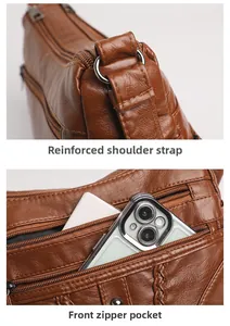 Detail view of reinforced shoulder strap D-ring and front zipper pocket for smartphone