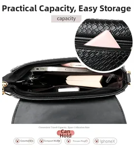 Detail showing the internal capacity and black woven leather texture of the crossbody bag