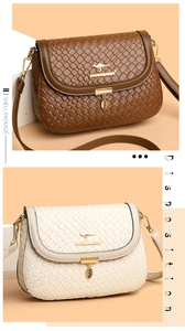 Close-up of woven leather texture with gold kangaroo logo and leaf pendant on flap bags
