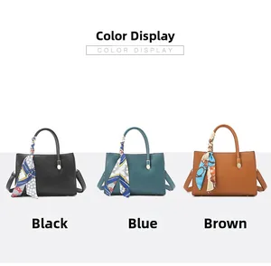 Three-color display of lychee texture handbags in black, blue and brown with silk scarves