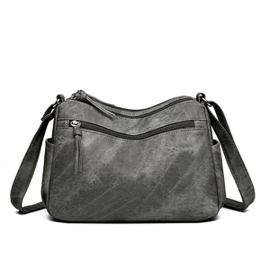 Sac bandoulière rétro gris pour femme avec plusieurs poches zippées et bandoulière