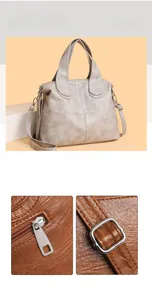 Close-up of litchi texture faux leather and smooth metal zipper on handbag