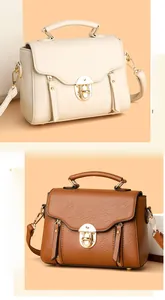 Detail of square crossbody bags in beige and brown with golden twist locks and texture