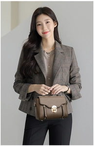 Fashionable dark brown pebble leather crossbody bag with golden metal buckle and flap