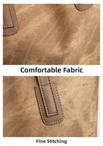 Detail of vintage brown tote bag showing fabric texture and leather stitching craftsmanship