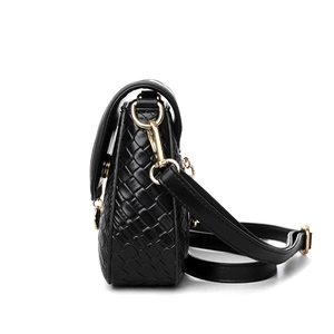 Black woven leather crossbody bag with adjustable strap and gold metal buckle