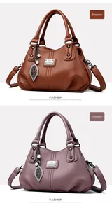 Detail of soft faux leather texture with leaf pearl charm and metal kangaroo logo