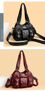 Detail view of large capacity handbags in black and burgundy with multiple pockets