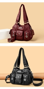 Detail of vintage leather multi-pocket tote bags in black and burgundy with floral zippers