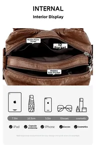 Detail view of large capacity brown bag showing multi-pocket interior and storage layout