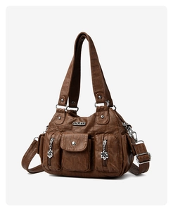 Close-up of dark brown multi-pocket tote bag with matte wrinkled PU leather texture