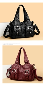 Detail of vintage textured leather handbags with multiple pockets and silver hardware