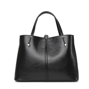 Classic black leather tote bag with silver metal studs and double top handles for women