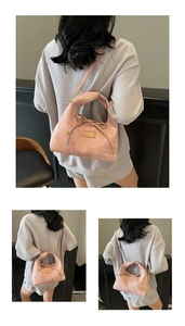 Detail of pink matte hobo bag with ribbon bow and adjustable shoulder strap feature