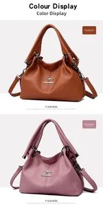 Vertical display of embossed leather tote bags in tan and purple with kangaroo metal logo
