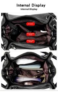 Detailed interior of black embossed leather tote bag showing large capacity and compartments