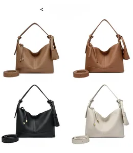 Hobo shoulder bag collection in yellow, brown, black and white colors with lychee texture
