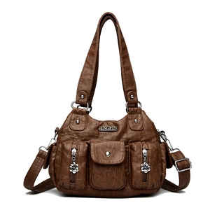 Retro brown large capacity multi-pocket shoulder bag in soft leather with silver details