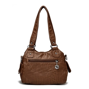 Retro large capacity dark brown faux leather shoulder bag with silver floral pendant
