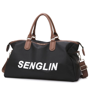 Black large capacity travel bag with brown leather handles and SENGLIN logo on white background