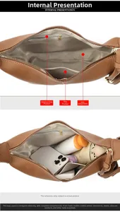 Internal view of brown leather bag showing zipper pocket and spacious compartments