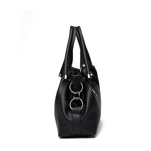 Black pebbled leather tote bag with silver hardware and large capacity for women
