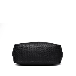 Bottom view of large black tote bag with premium lychee grain leather and reinforced base