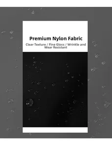 Detailed close-up of water-resistant black nylon fabric with high-density weave texture