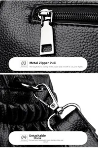 Macro detail of silver hardware zipper pull and detachable hook on black leather bag