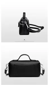 Detail of premium lychee grain leather handbag showing smooth zipper and U-shaped back pocket
