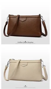 Vue détaillée de pochettes en cuir grainé café et abricot avec fermeture zippée