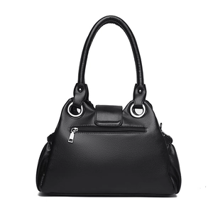Fashionable black pebbled leather underarm bag with silver rivets and metal hardware